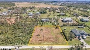 4695 Gulf Shore Road St. James City, FL 33956 - Photo 11 of 13 an aerial view of residential houses with outdoor space