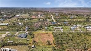 4695 Gulf Shore Road St. James City, FL 33956 - Photo 8 of 13 an aerial view of residential building with green space
