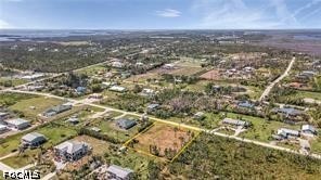 4695 Gulf Shore Road St. James City, FL 33956 - Photo 9 of 13 an aerial view of residential house and ocean