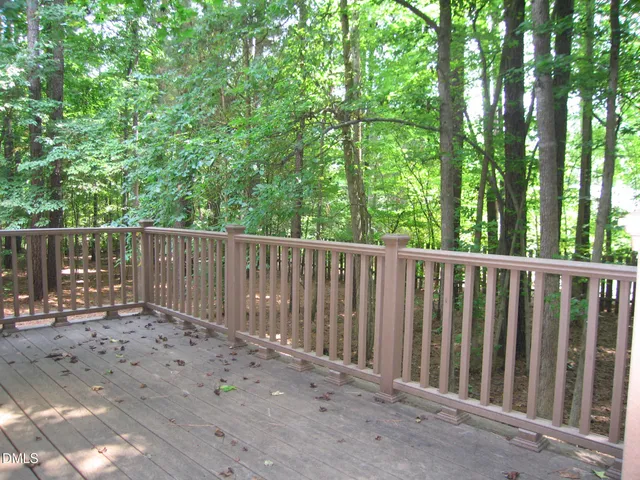 a view of a wooden fence