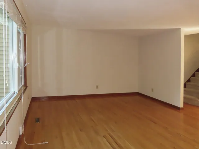 a view of a room with a window