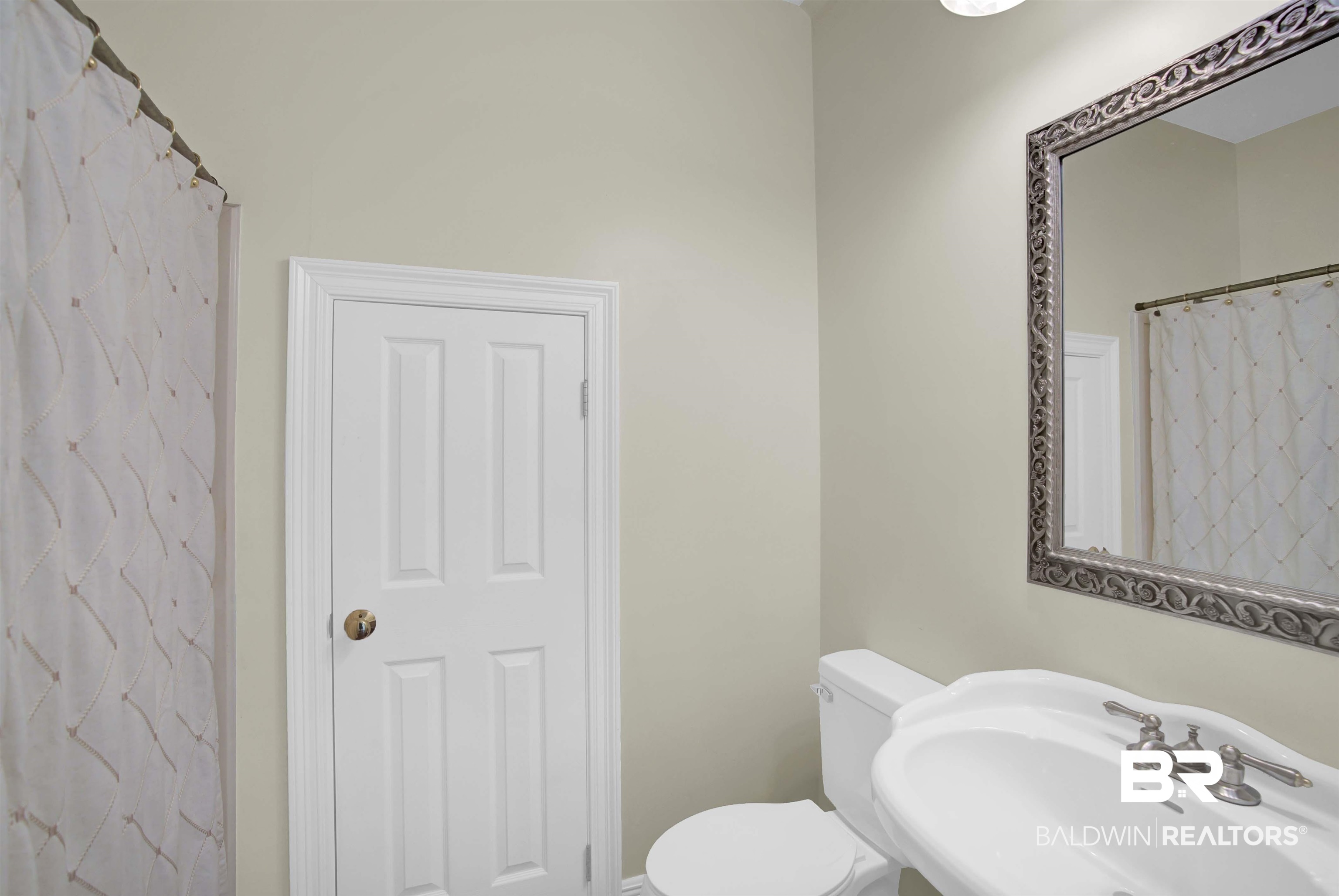 27688 Rigsby Road Daphne, AL 36526 - Photo 43 of 56 Bathroom with toilet and sink