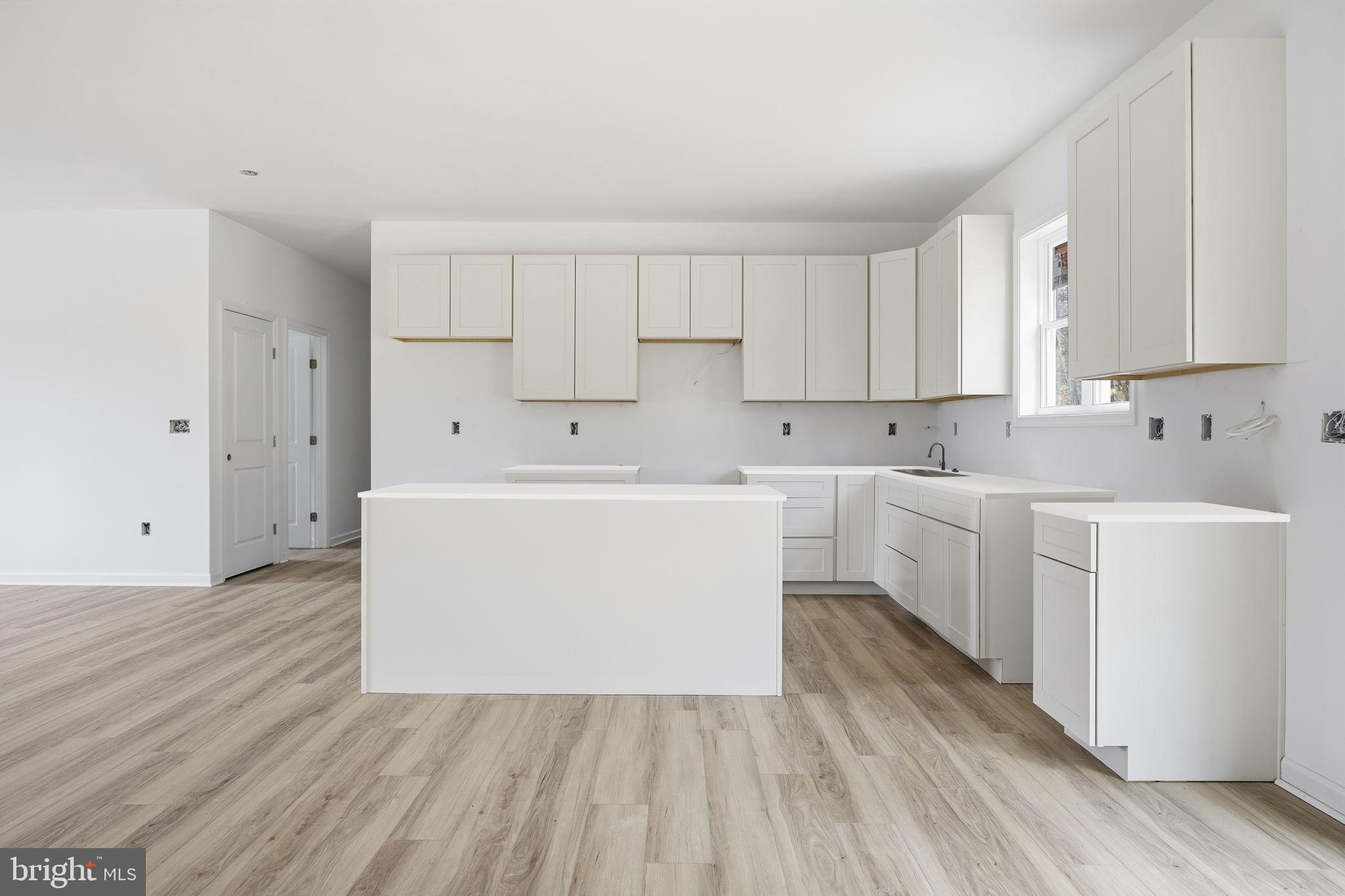 629 Providence Church Road Hedgesville, WV 25427 - Photo 19 of 54 a utility room with cabinets washer and dryer