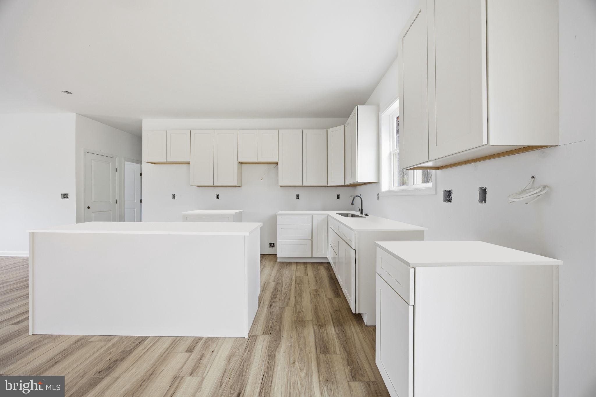 629 Providence Church Road Hedgesville, WV 25427 - Photo 20 of 54 a utility room with cabinets washer and dryer
