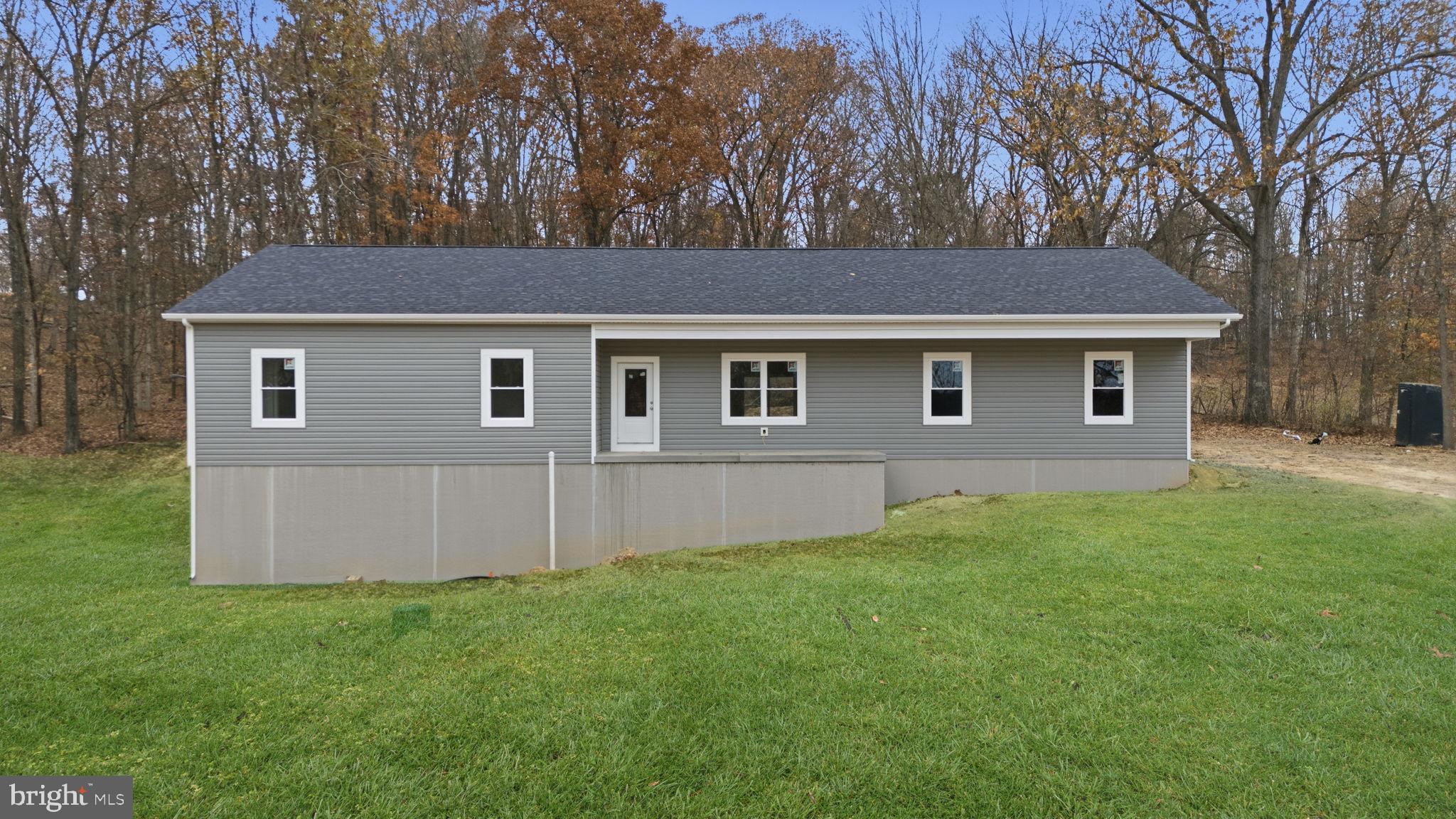 629 Providence Church Road Hedgesville, WV 25427 - Photo 2 of 54 a house view with backyard space