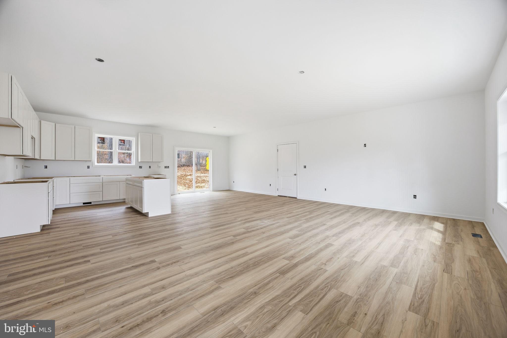 629 Providence Church Road Hedgesville, WV 25427 - Photo 21 of 54 a view of empty room with wooden floor