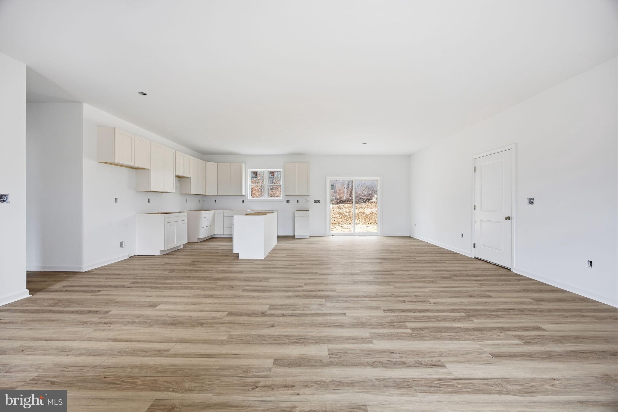 629 Providence Church Road Hedgesville, WV 25427 - Photo 22 of 54 a view of kitchen and empty room