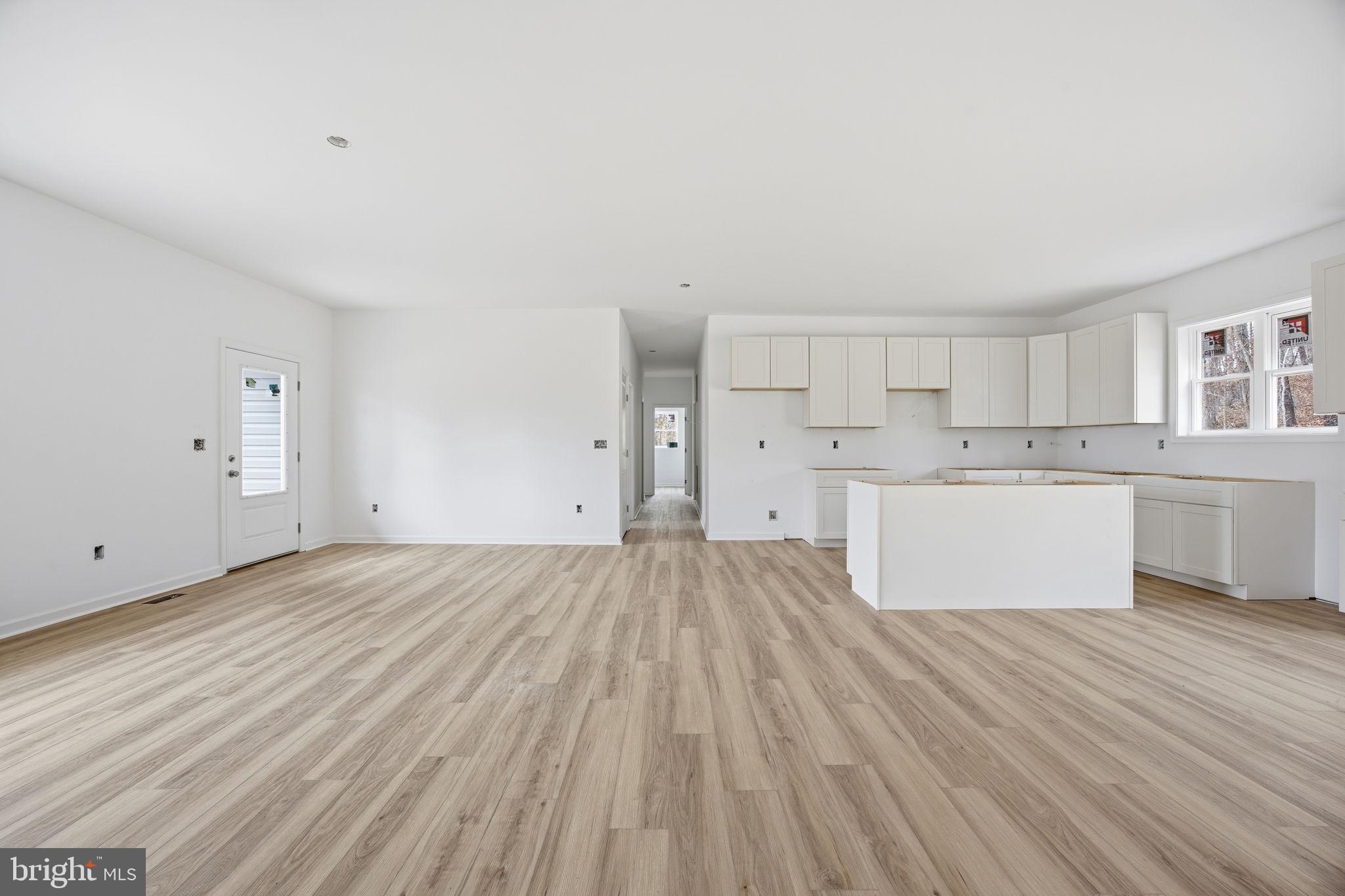 629 Providence Church Road Hedgesville, WV 25427 - Photo 24 of 54 a view of a kitchen with wooden floor and electronic appliances
