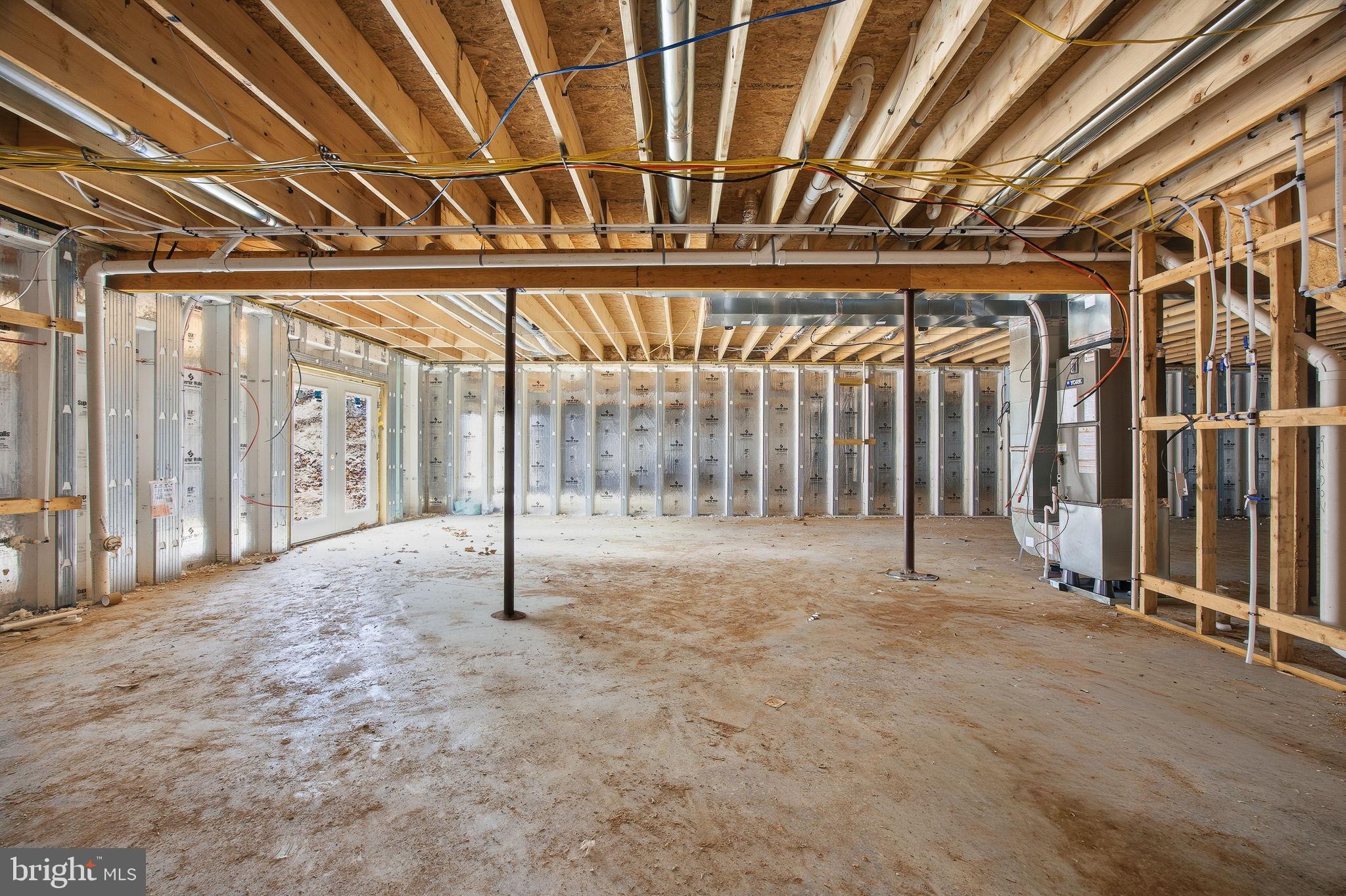 629 Providence Church Road Hedgesville, WV 25427 - Photo 48 of 54 a view of an empty room with wooden floor