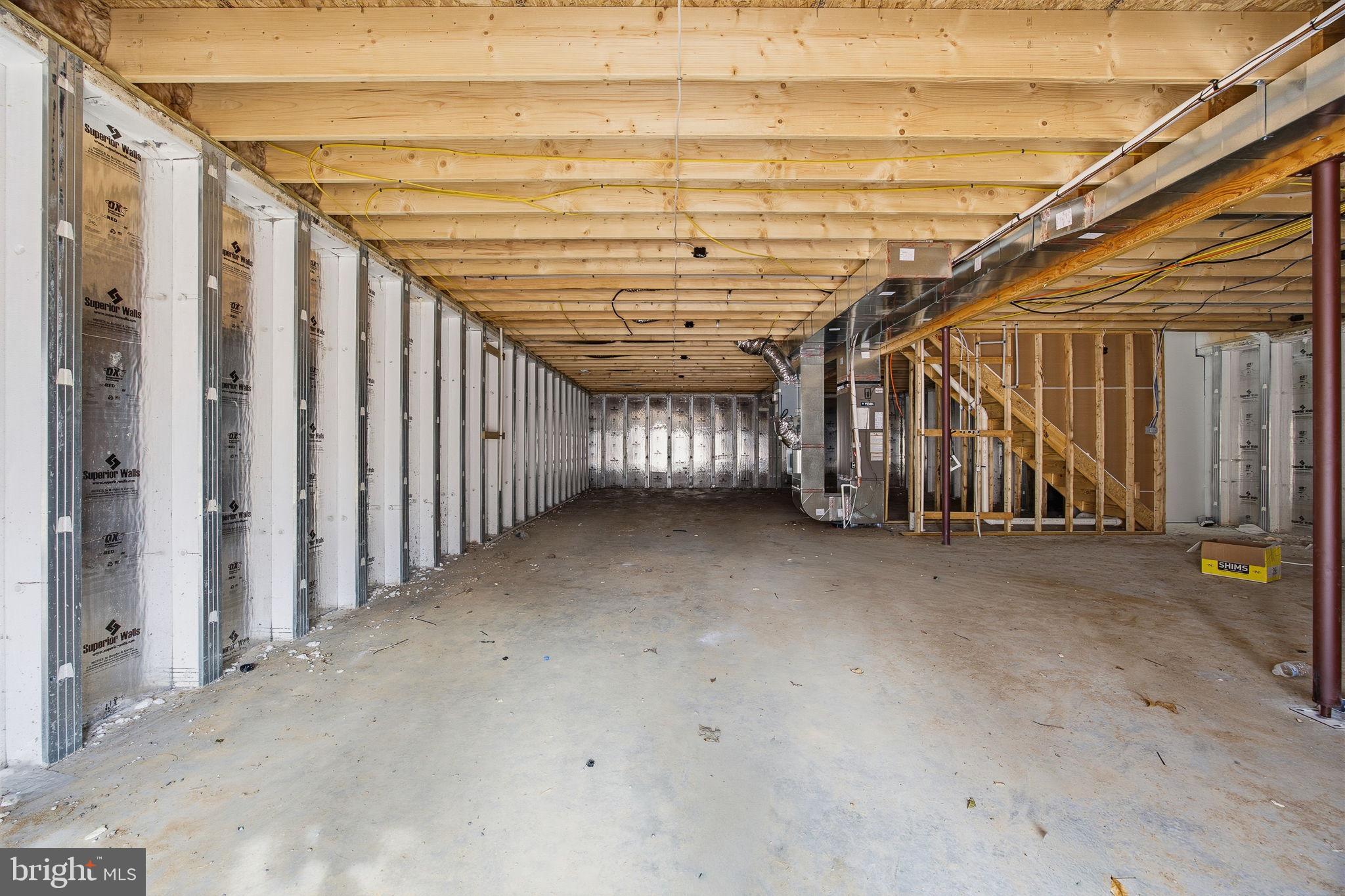 629 Providence Church Road Hedgesville, WV 25427 - Photo 50 of 54 a view of an empty room with wooden walls