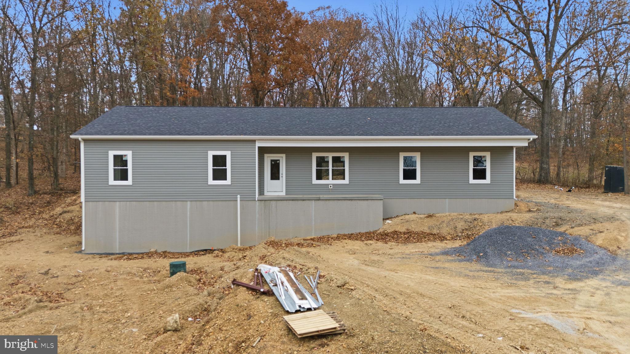629 Providence Church Road Hedgesville, WV 25427 - Photo 9 of 54 a house view with a outdoor space
