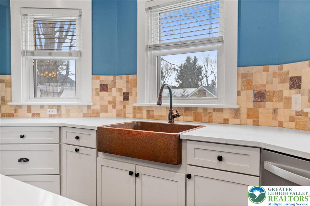 4303 Newburg Road Bethlehem, PA 18020 - Photo 12 of 63 a view of cabinets a sink and a window in a kitchen