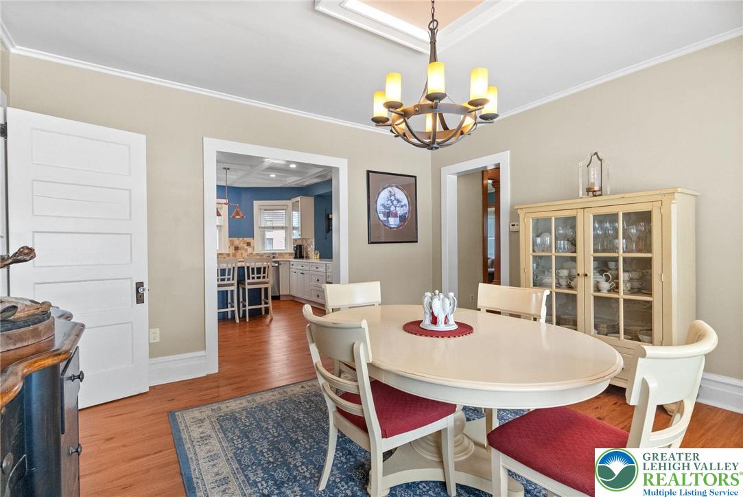 4303 Newburg Road Bethlehem, PA 18020 - Photo 20 of 63 a view of a dining room with furniture and chandelier