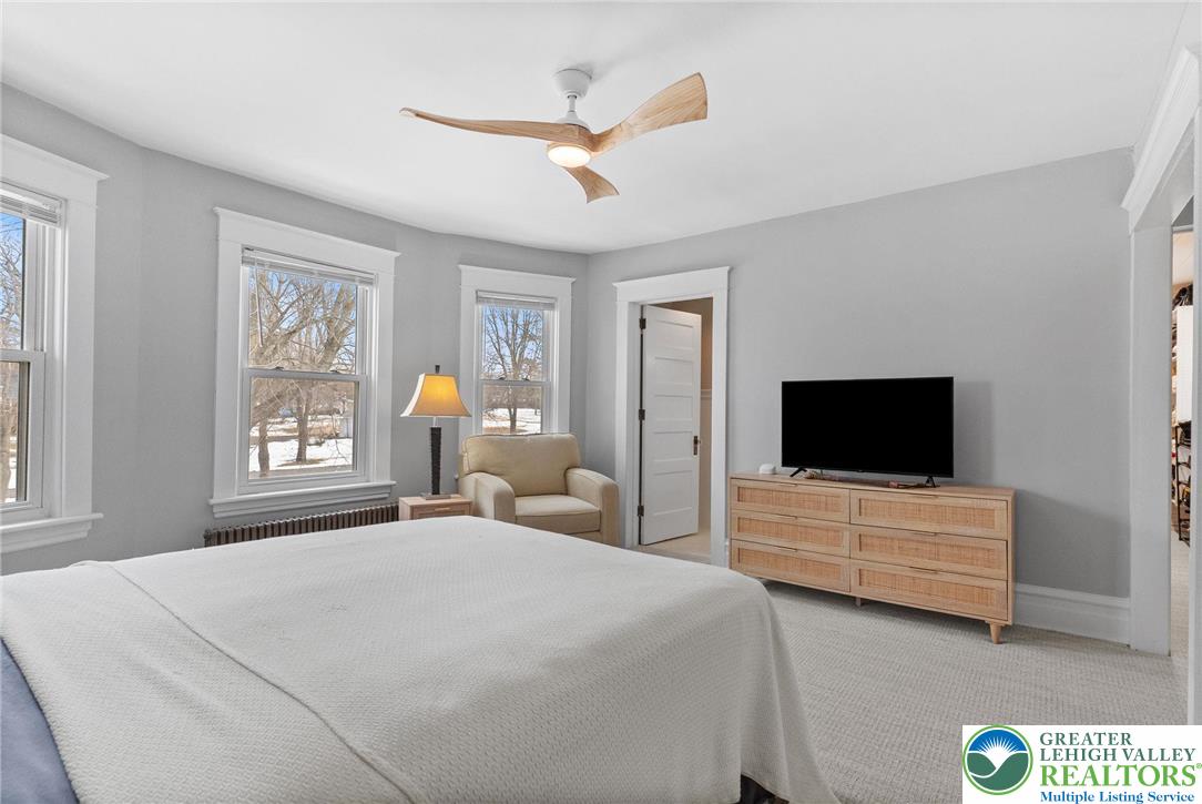 4303 Newburg Road Bethlehem, PA 18020 - Photo 30 of 63 a bedroom with a bed and a flat screen tv