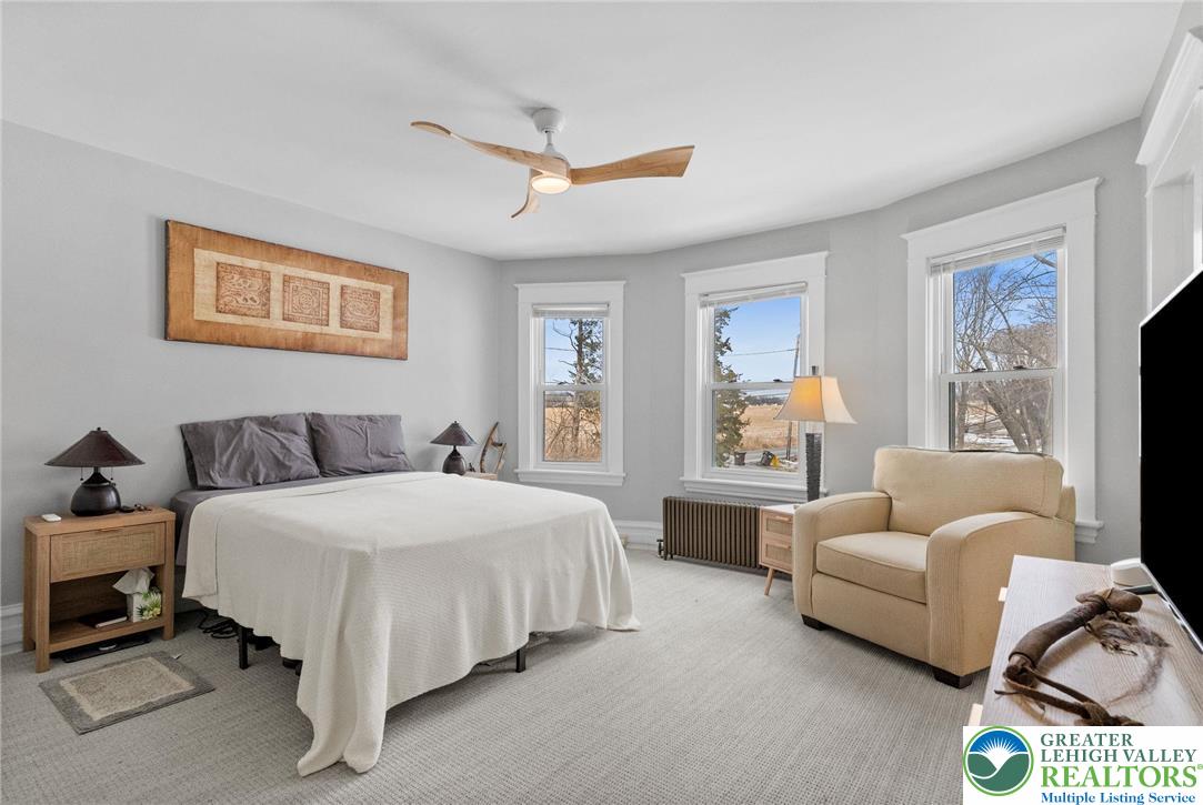 4303 Newburg Road Bethlehem, PA 18020 - Photo 31 of 63 a spacious bedroom with a bed and glass window