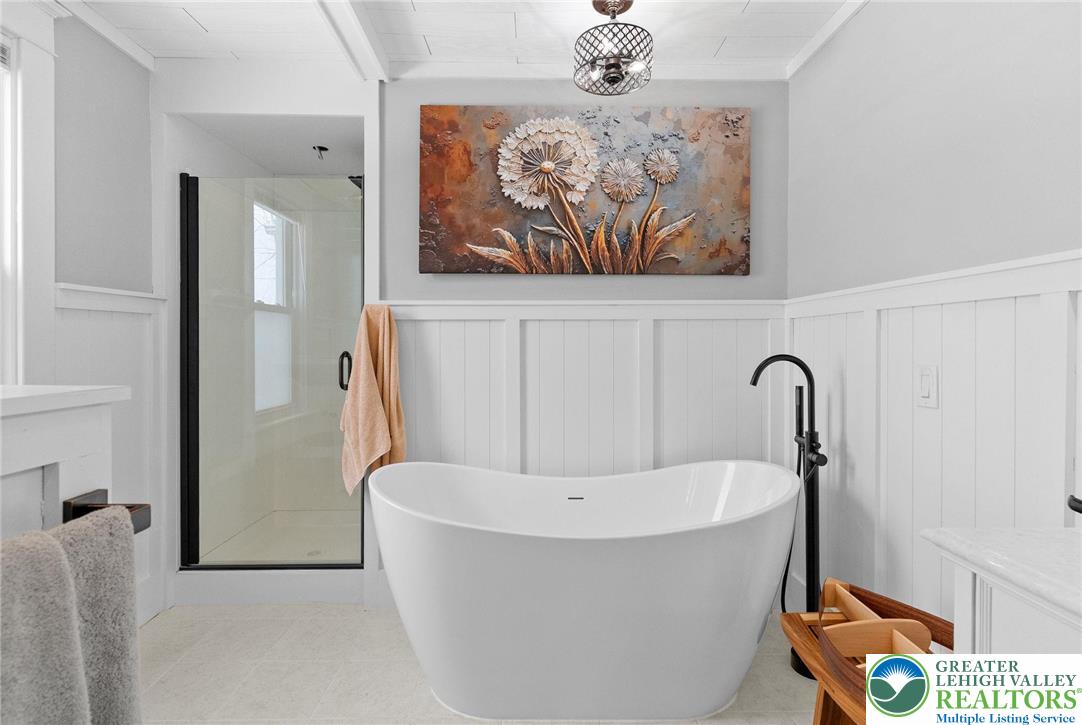 4303 Newburg Road Bethlehem, PA 18020 - Photo 35 of 63 a white bath tub sitting in a bathroom