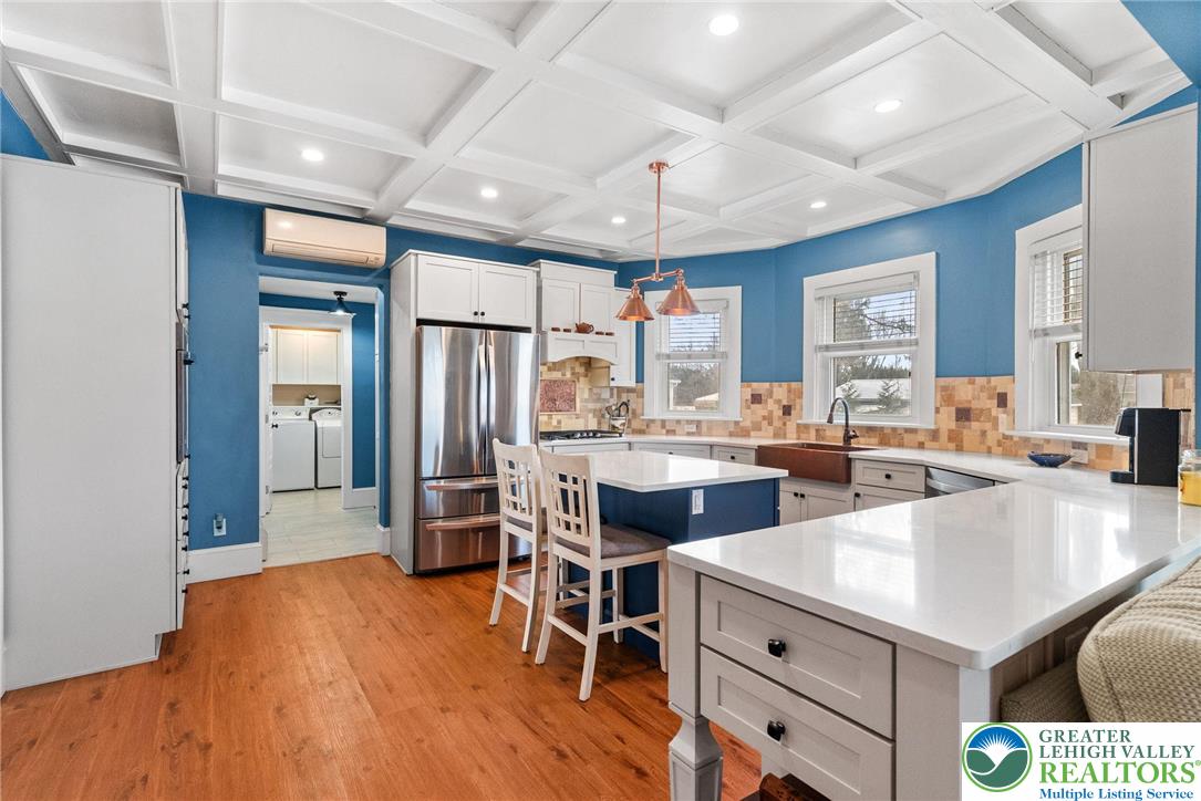 4303 Newburg Road Bethlehem, PA 18020 - Photo 9 of 63 a kitchen with a sink appliances and wooden floor