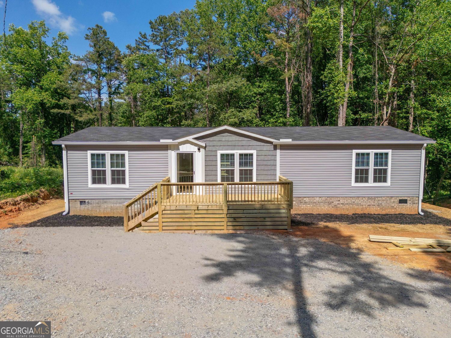 734 Hollywood Church Road Clarkesville, GA 30523 - Photo 1 of 49 a view of house with outdoor space and sitting area
