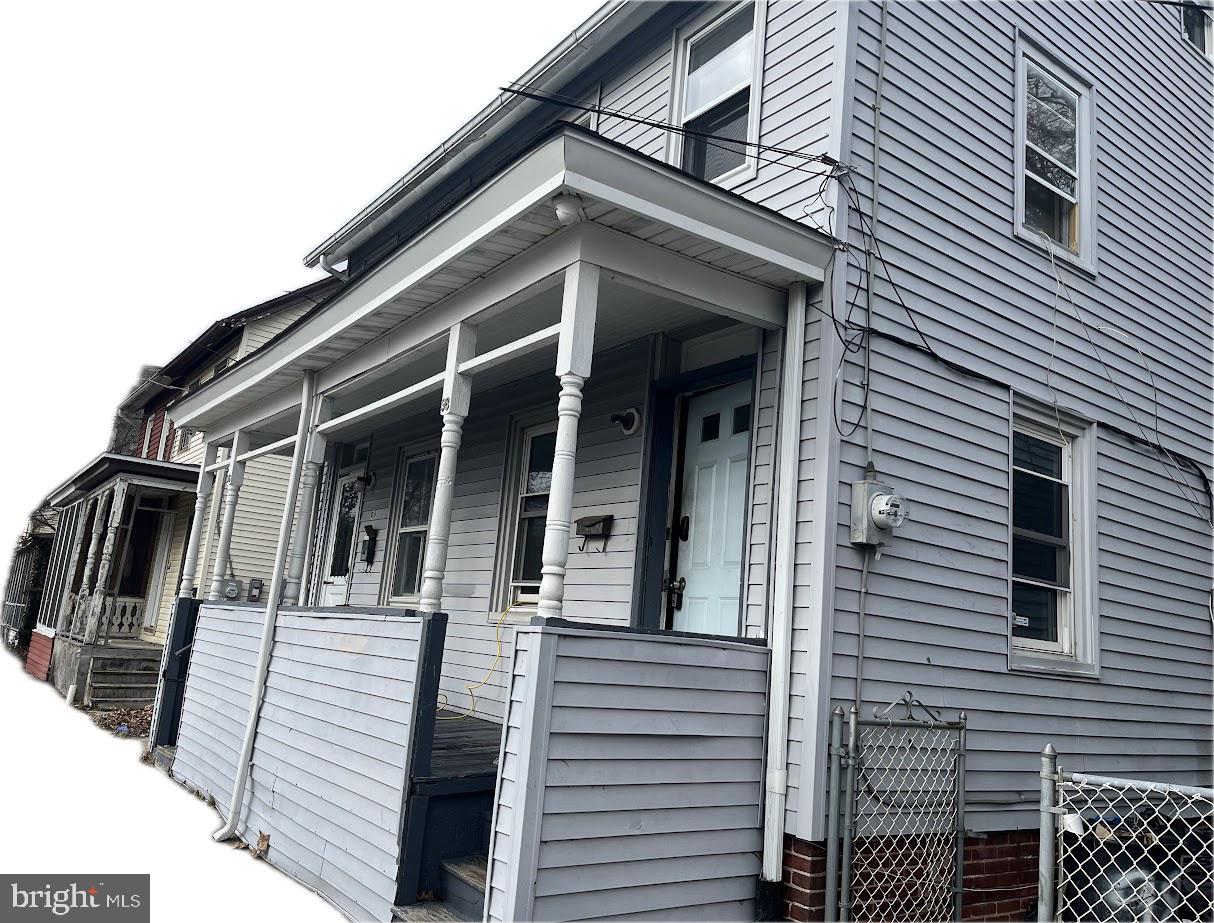 96 Thompson Street Salem, NJ 08079 - Photo 7 of 7 a view of a house with more windows and wooden stairs