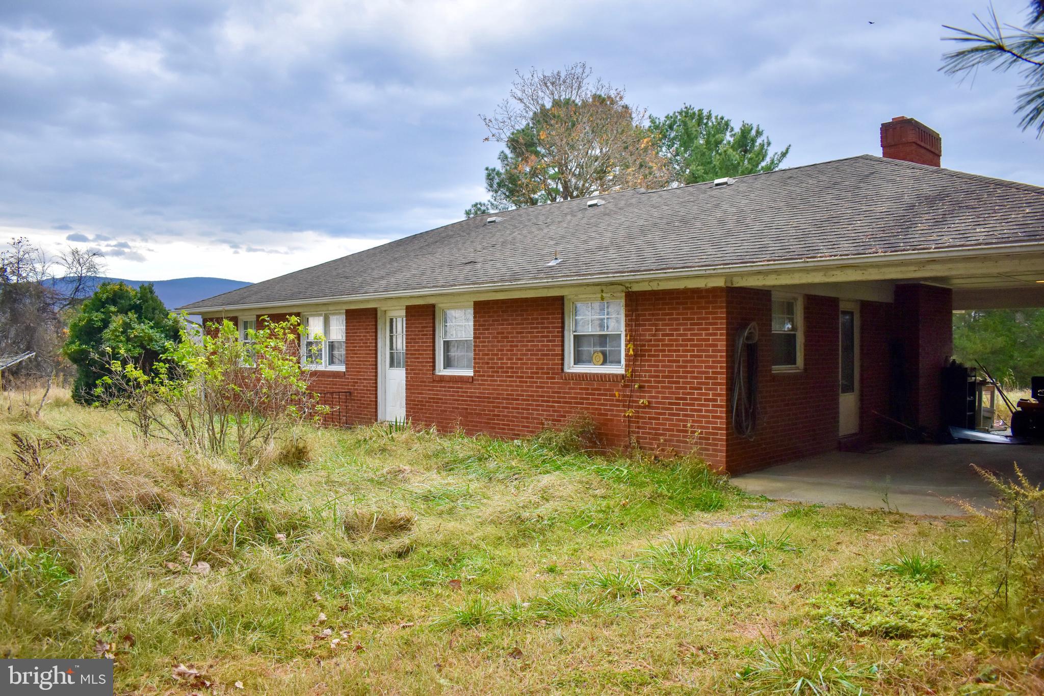 196 Good Mill Road Rileyville, VA 22650 - Photo 14 of 14 a view of a house with a yard