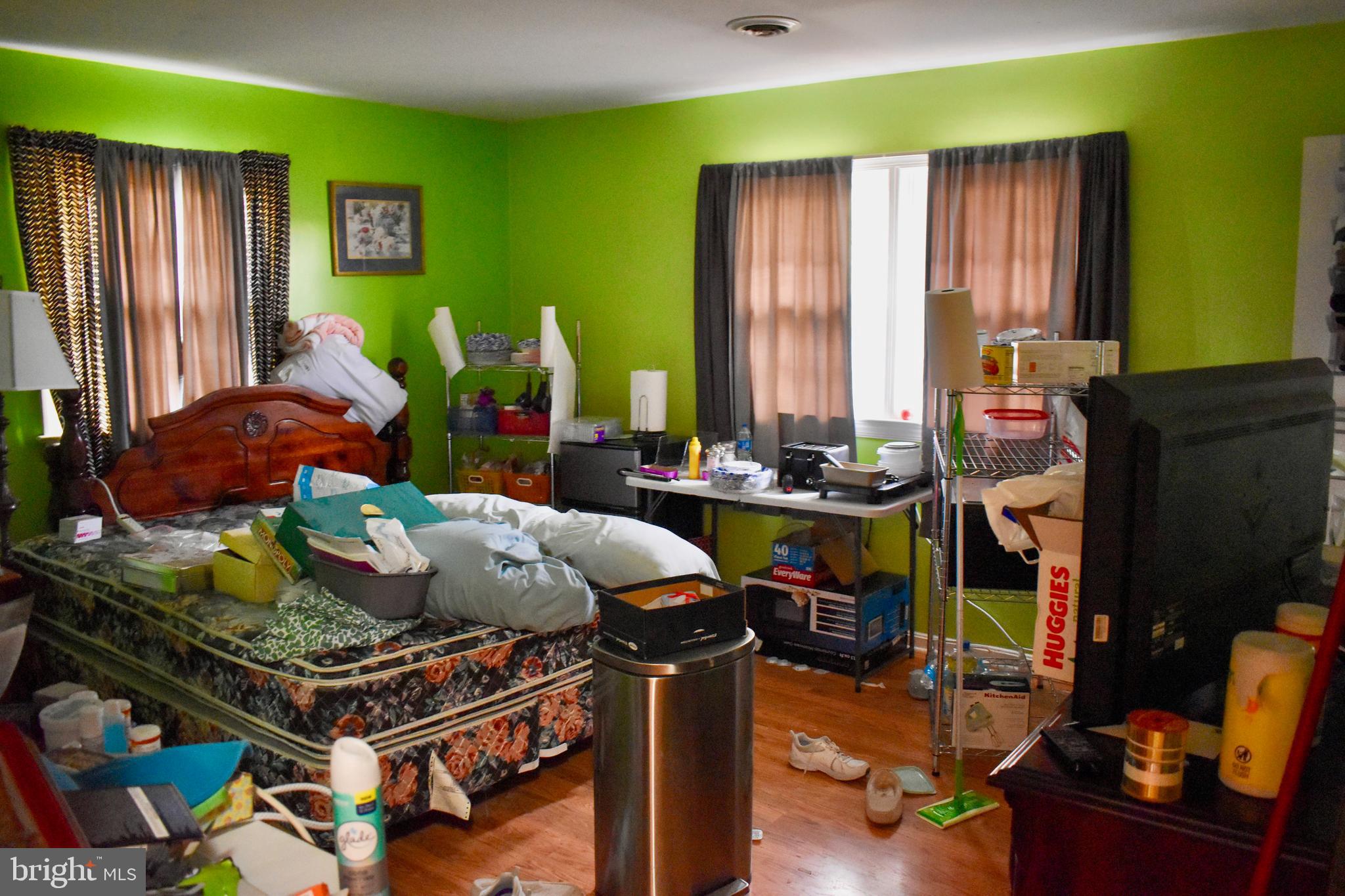 196 Good Mill Road Rileyville, VA 22650 - Photo 5 of 14 a living room with furniture a fireplace and a window