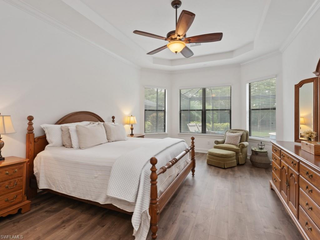 10191 Coconut Road Estero, FL 34135 - Photo 6 of 14 a bed room with bed and windows