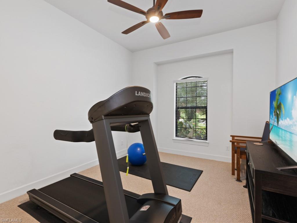 10191 Coconut Road Estero, FL 34135 - Photo 8 of 14 a living room with furniture and a window