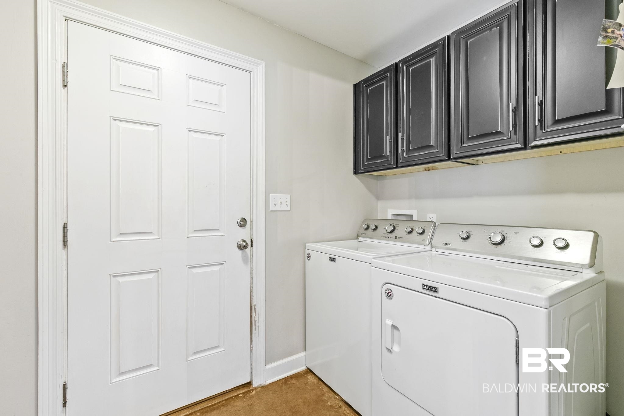 32072 Buzbee Road Daphne, AL 36527 - Photo 21 of 41 Clothes washing area featuring cabinets and washing machine and dryer
