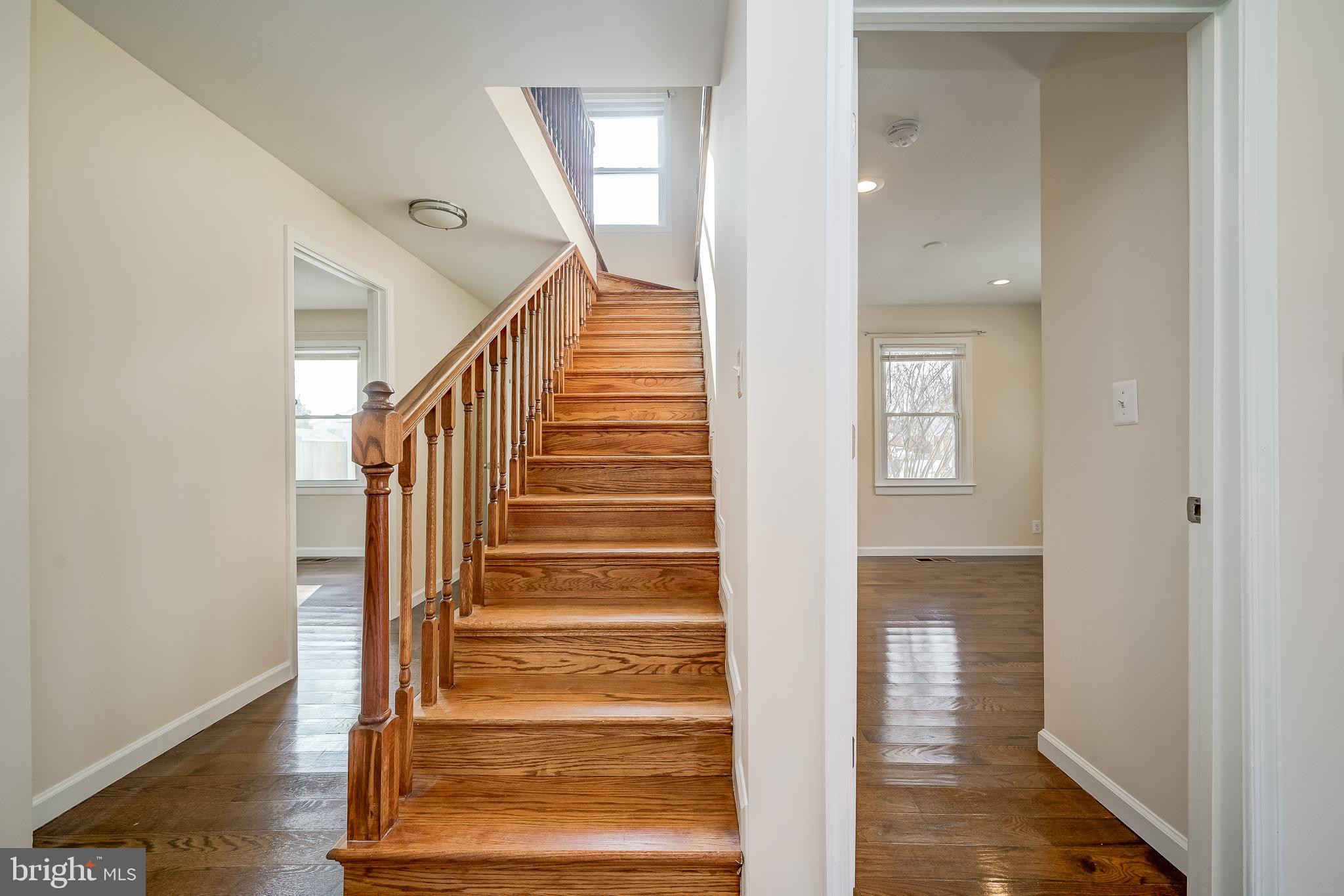816 Maple Avenue Laurel, MD 20707 - Photo 34 of 45 a view of entryway and hall with wooden floor