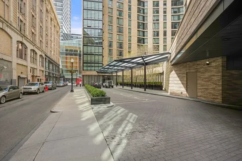 a view of water fountain with a couch