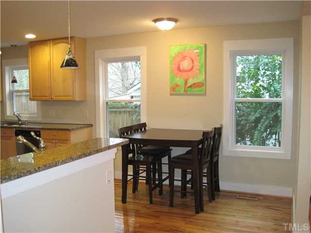 407 Glascock Street Raleigh, NC 27604 - Photo 9 of 25 Use the two stool counter or the eat-in kitchen area if your family is larger. This kitchen is multi-functional. Kitchen