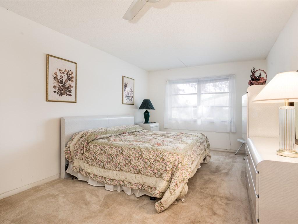 1285 High Point Place North, Unit D Delray Beach, FL 33445 - Photo 11 of 29 011_Master Bedroom