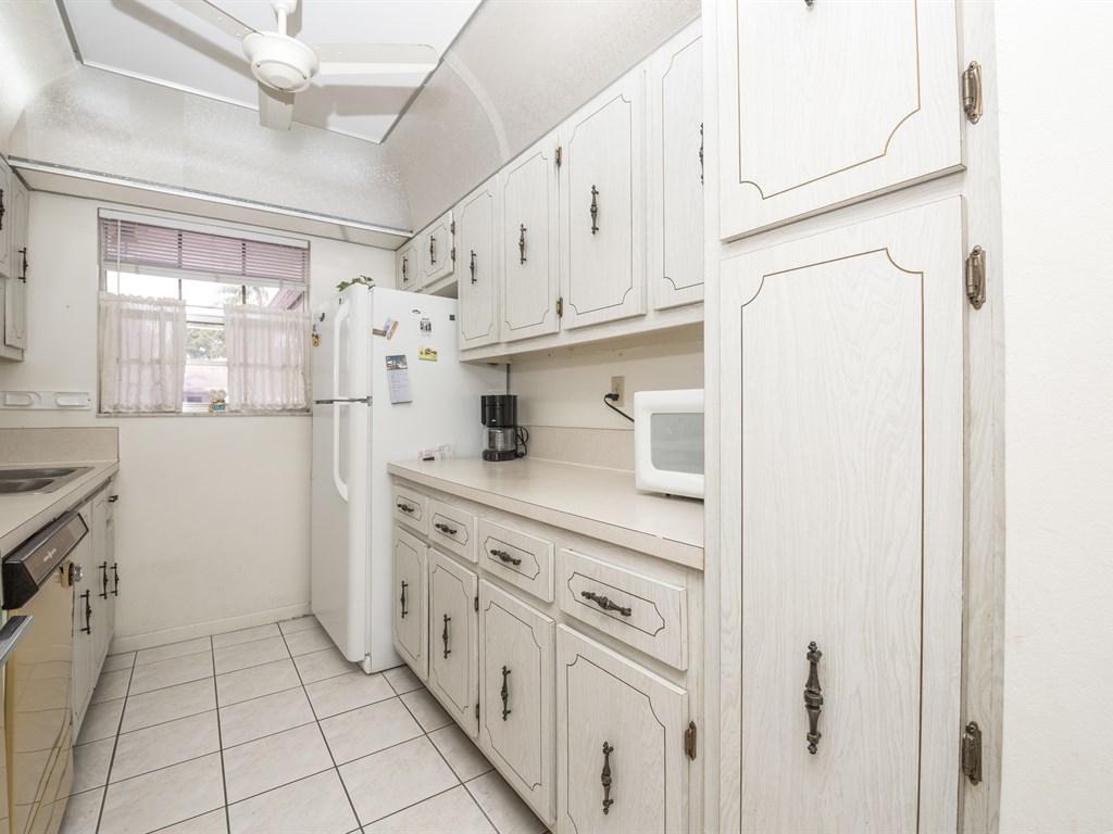 1285 High Point Place North, Unit D Delray Beach, FL 33445 - Photo 9 of 29 009_Kitchen Two