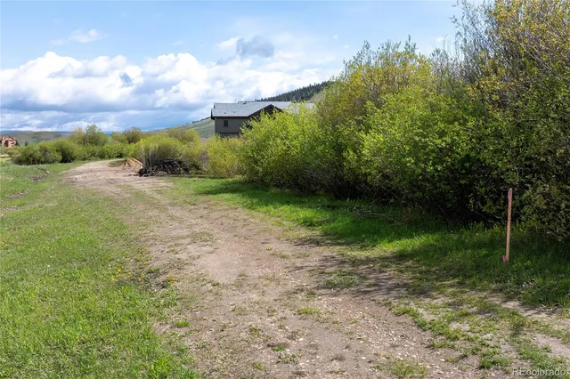 a view of a lake with a city