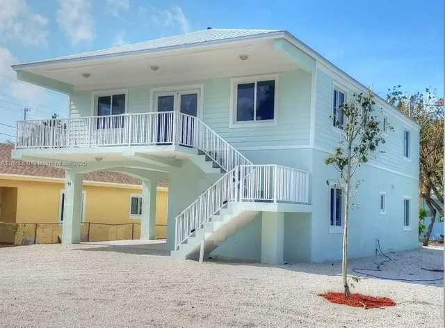a view of a house with a swimming pool