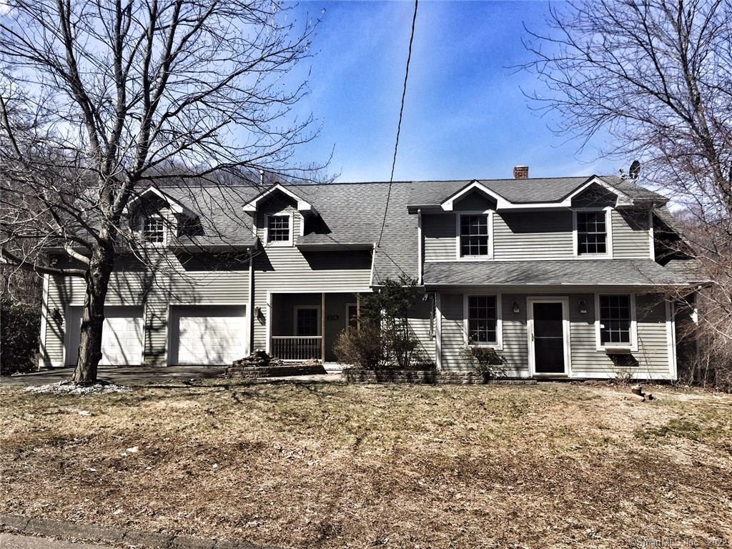 278 Old Wolcott Road Bristol, CT 06010 - Photo 1 of 1 a front view of a house with street