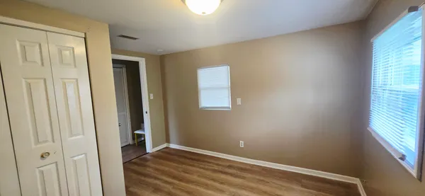 an empty room with windows