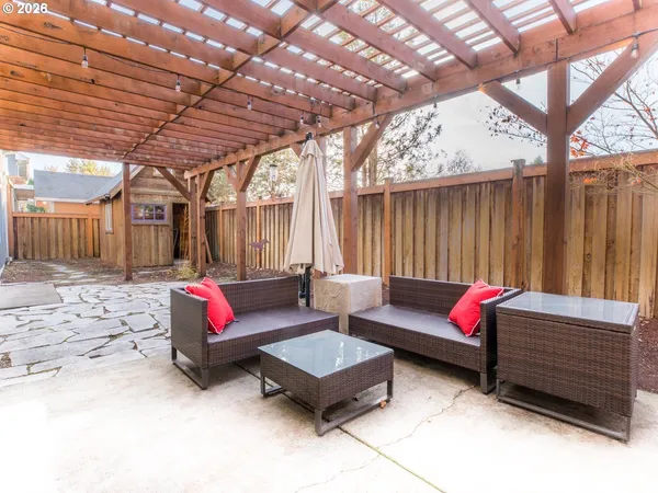 a living room with furniture and a outdoor space