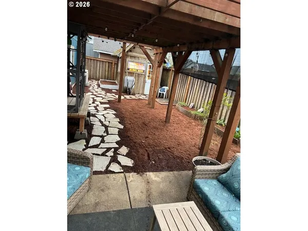 a view of balcony with furniture