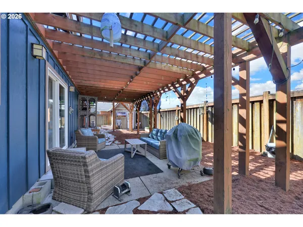 a view of living room filled with furniture and a table