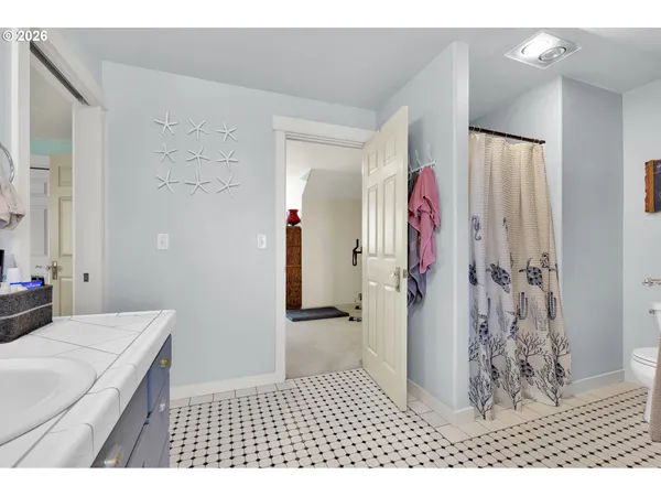 a bedroom with a bed and a cabinets