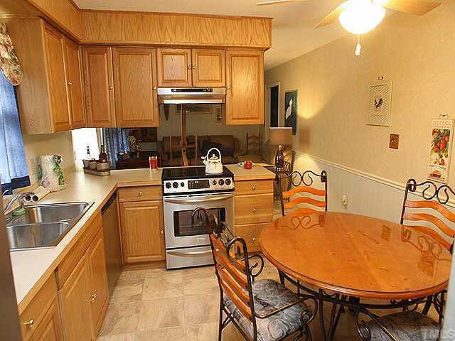 1701 Spring Drive Garner, NC 27529 - Photo 2 of 9 Updated cabinets and appliances in this great kitchen!