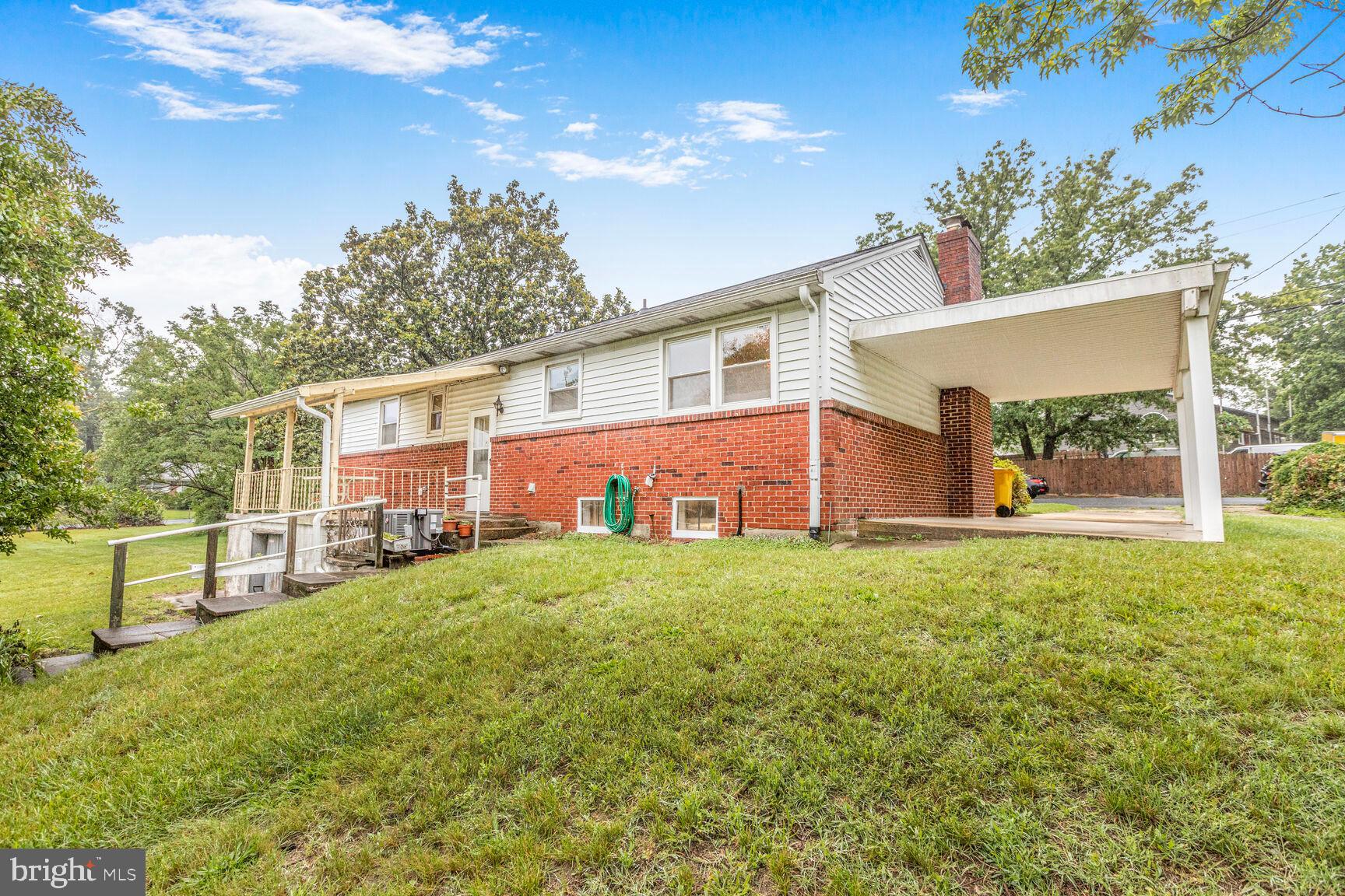 7423 Phelps Road Hanover, MD 21076 - Photo 24 of 28 a view of a house with backyard