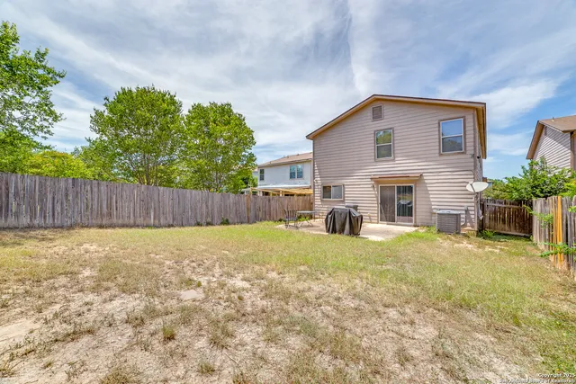 a house view with a garden space