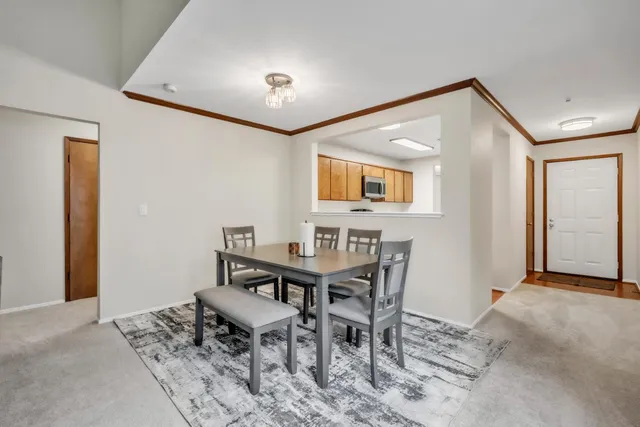 a view of a livingroom with furniture and a window