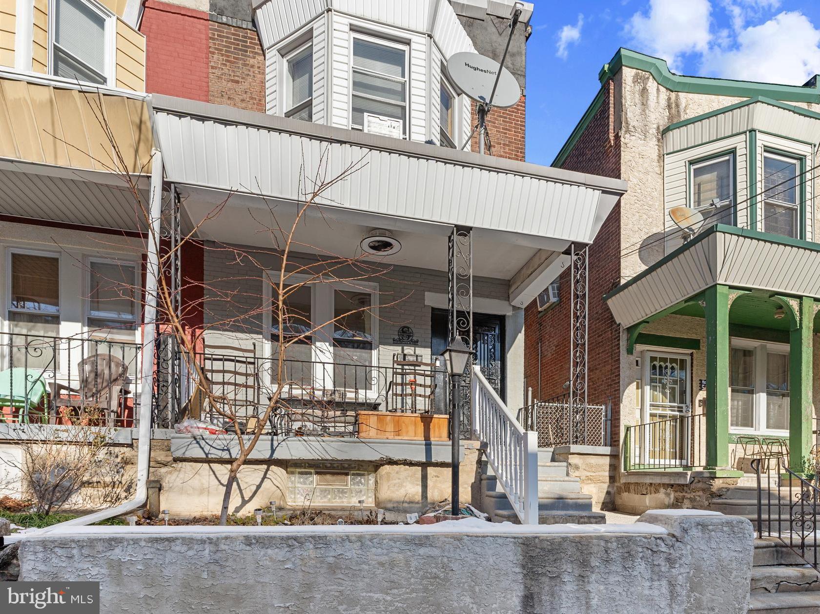 5129 Keyser Street Philadelphia, PA 19144 - Photo 4 of 13 front view of house with a street