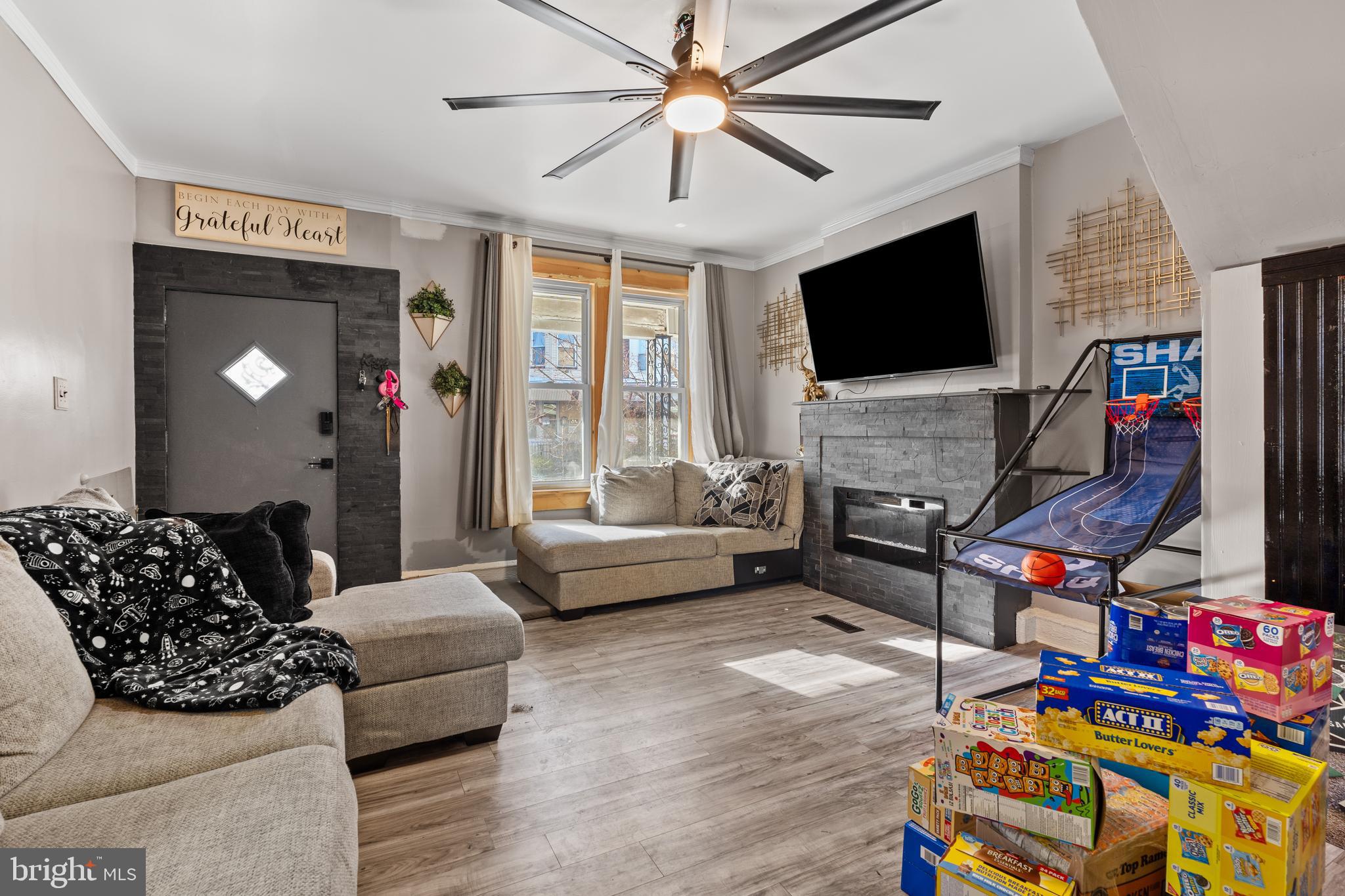 5129 Keyser Street Philadelphia, PA 19144 - Photo 5 of 13 a living room with furniture and a flat screen tv
