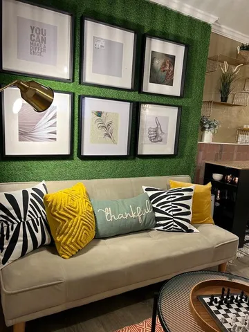 a balcony view with a rug