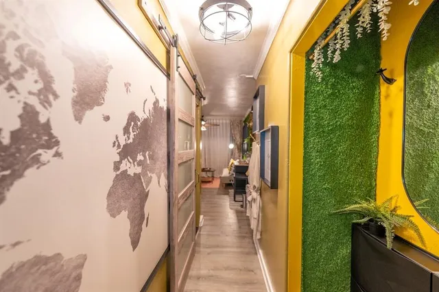 a view of swimming pool with a balcony