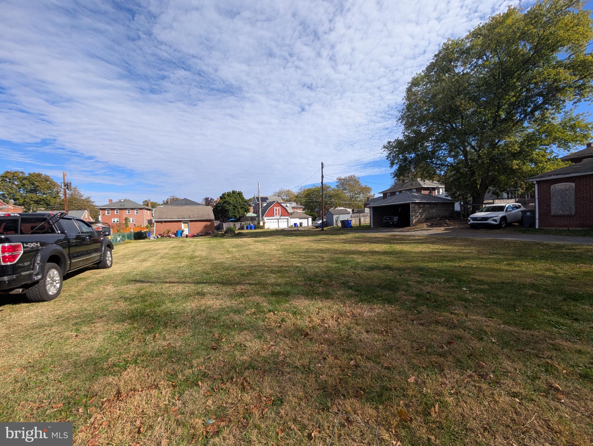 1237 South Street Pottstown, PA 19464 - Photo 2 of 6 a view of a yard with cars
